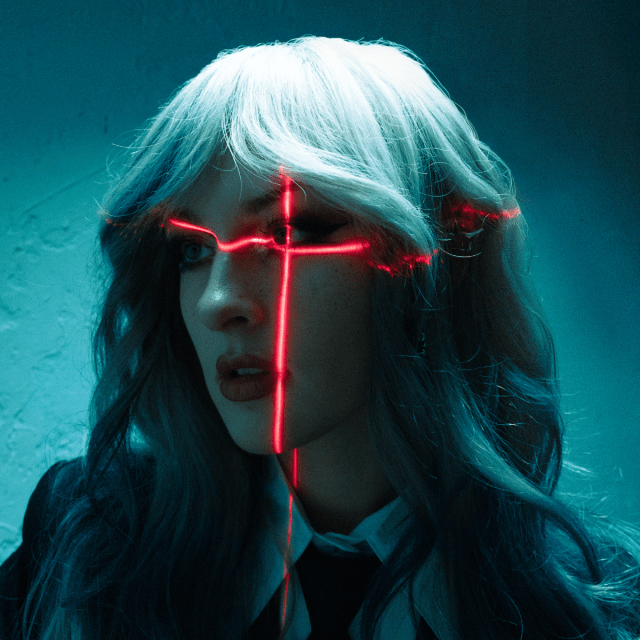 Mothica with a red laser cross over her eye.