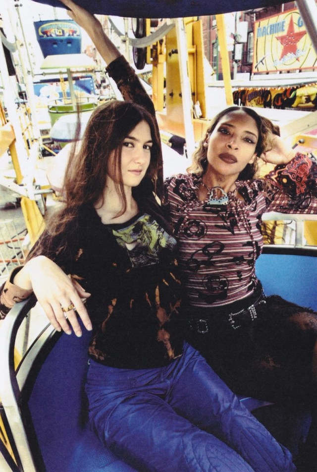 SPELLLING sitting next to Weyes Blood.